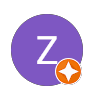 Purple circular icon with a white letter Z and a small orange star badge.